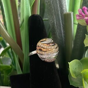 Elegant Silver and Gold Swirl Ring
